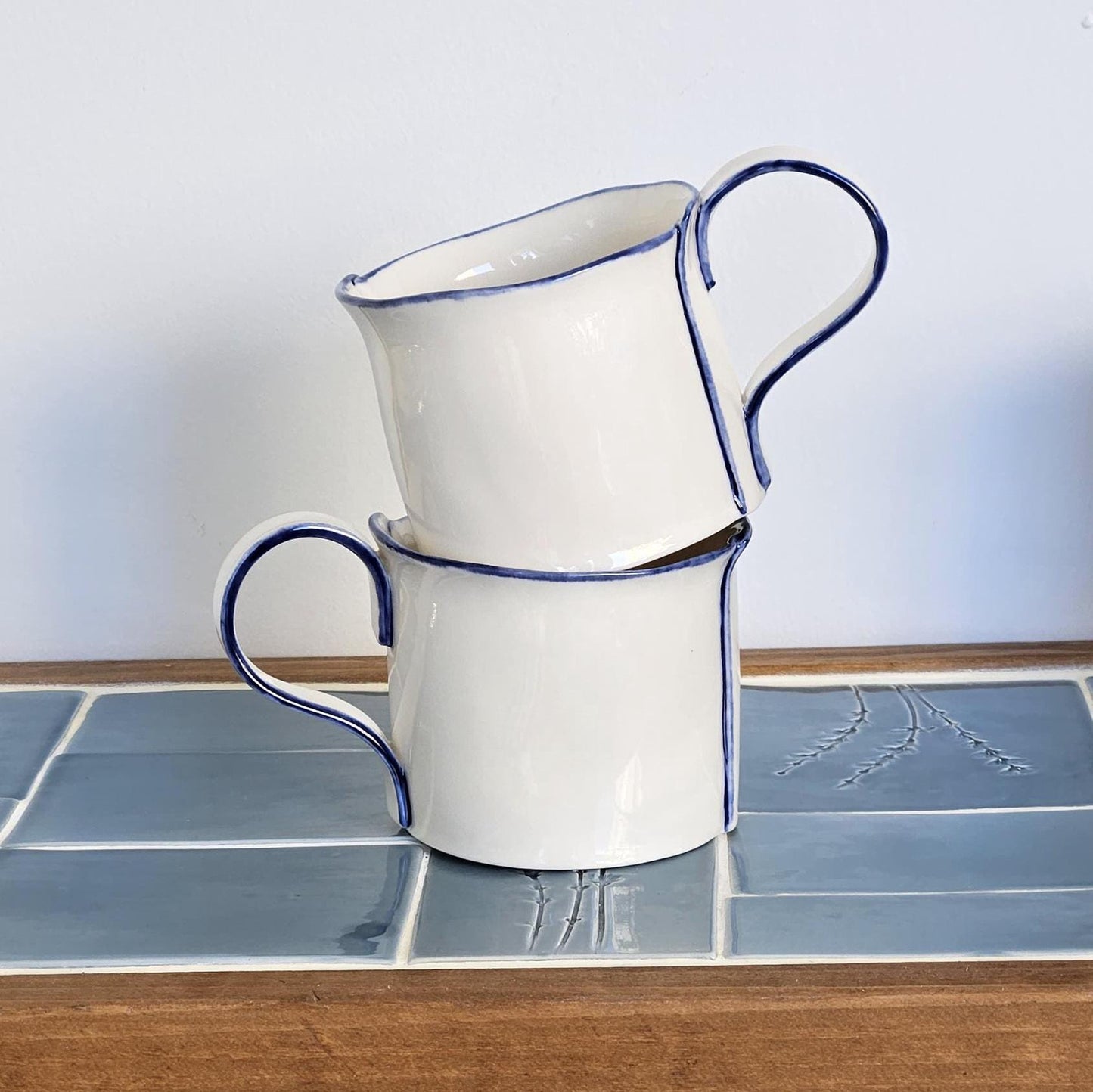 White Porcelain Mug with Handmade Blue Detailing