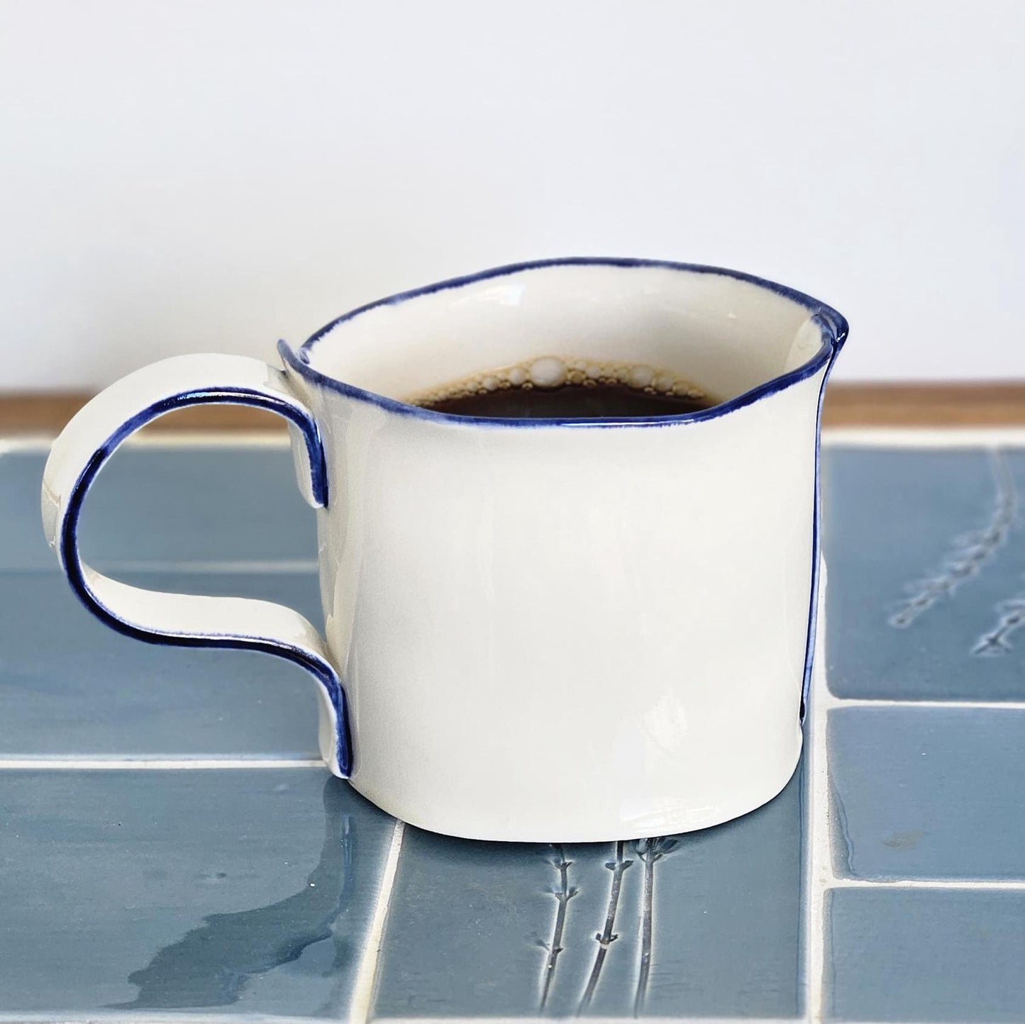 White Porcelain Mug with Handmade Blue Detailing